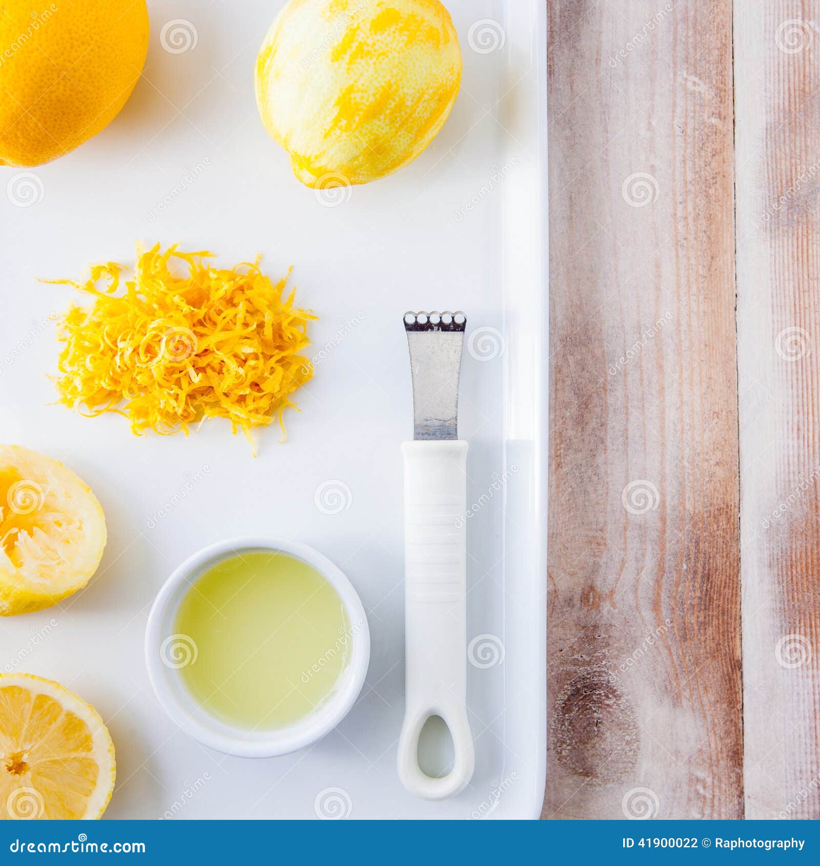 Baking Ingredients for a Lemon Cake Whole Lemon and Lemon Rind Stock