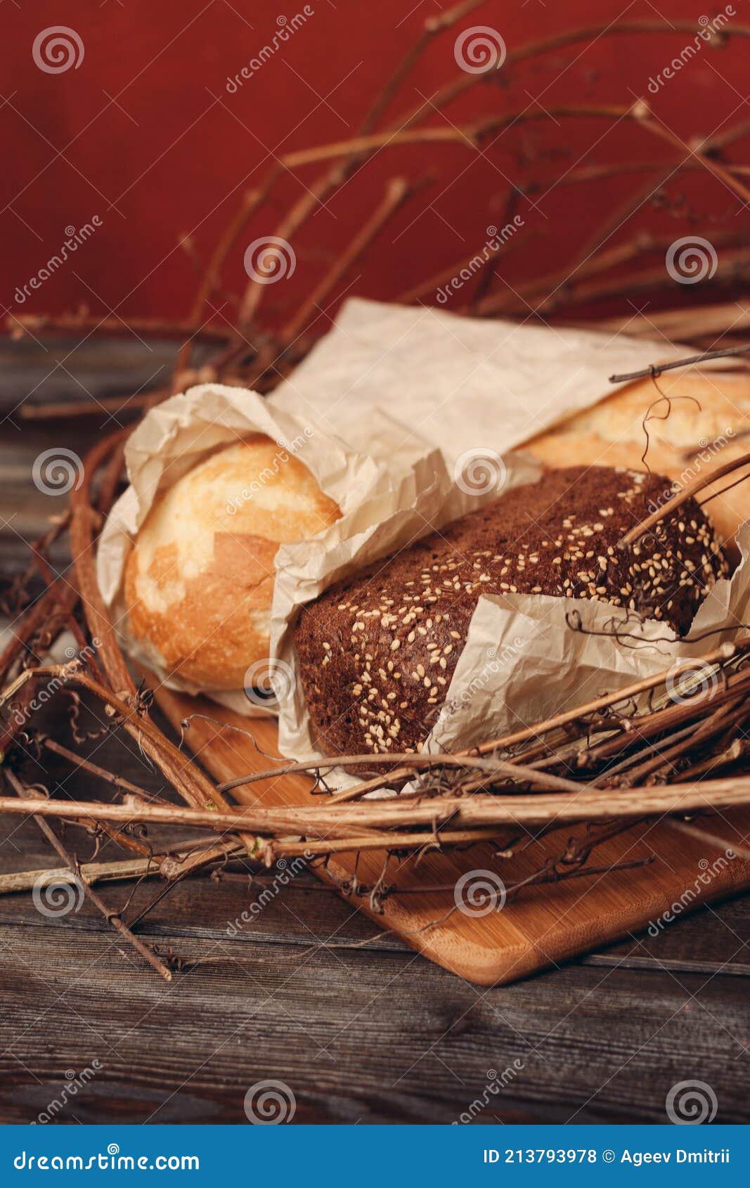 Baking Loaf of Bread Flour Product in a Nest on a Wooden Table
