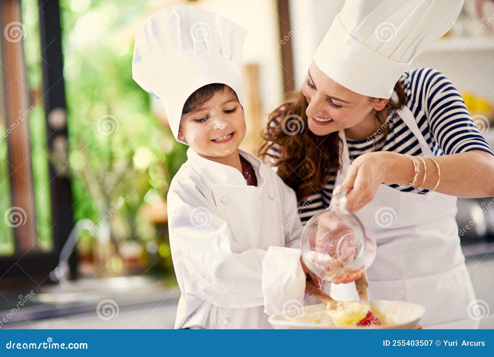 Baking is Love Made Edible. a Mother and Her Son Baking in the Kitchen. Stock Image Image of