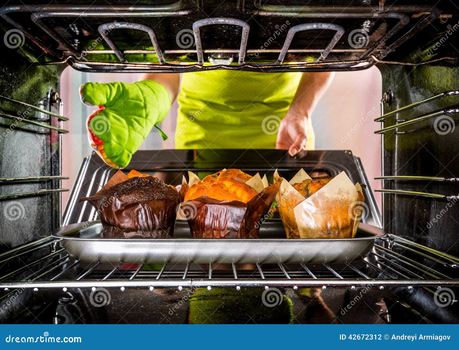 Baking muffins in the oven stock photo. Image of birthday 42672312