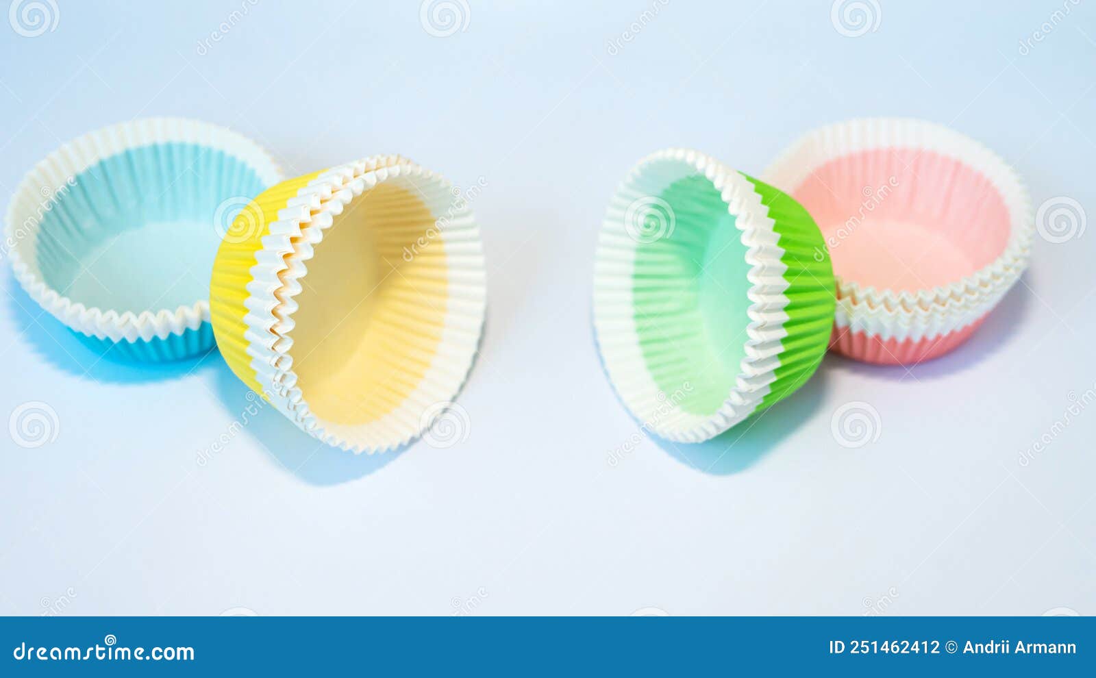 For Baking Multicolored Molds for Muffin and Cake Baskets. Stock Photo