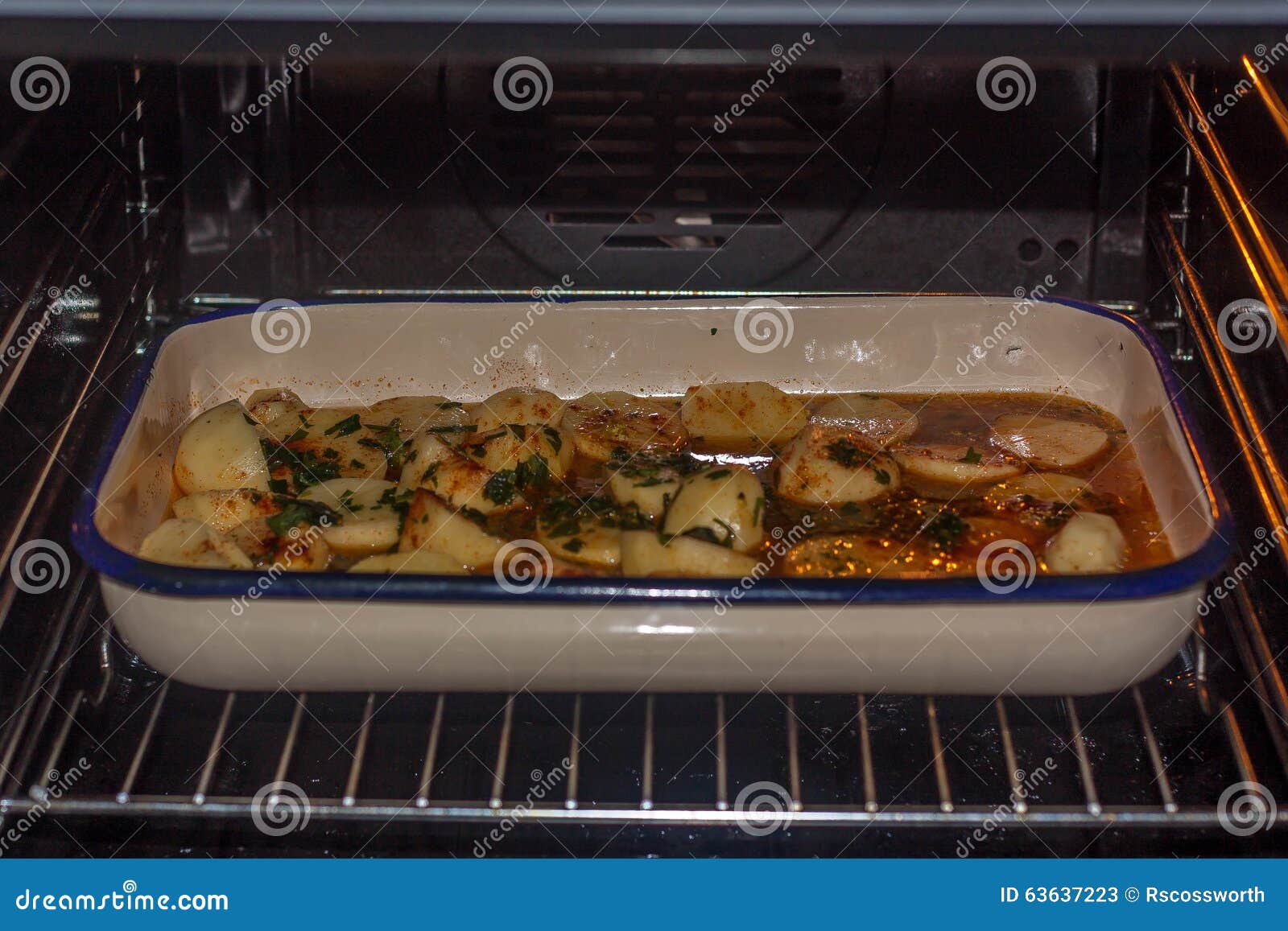 Bakingpan into oven stock image. Image of baking, food 63637223