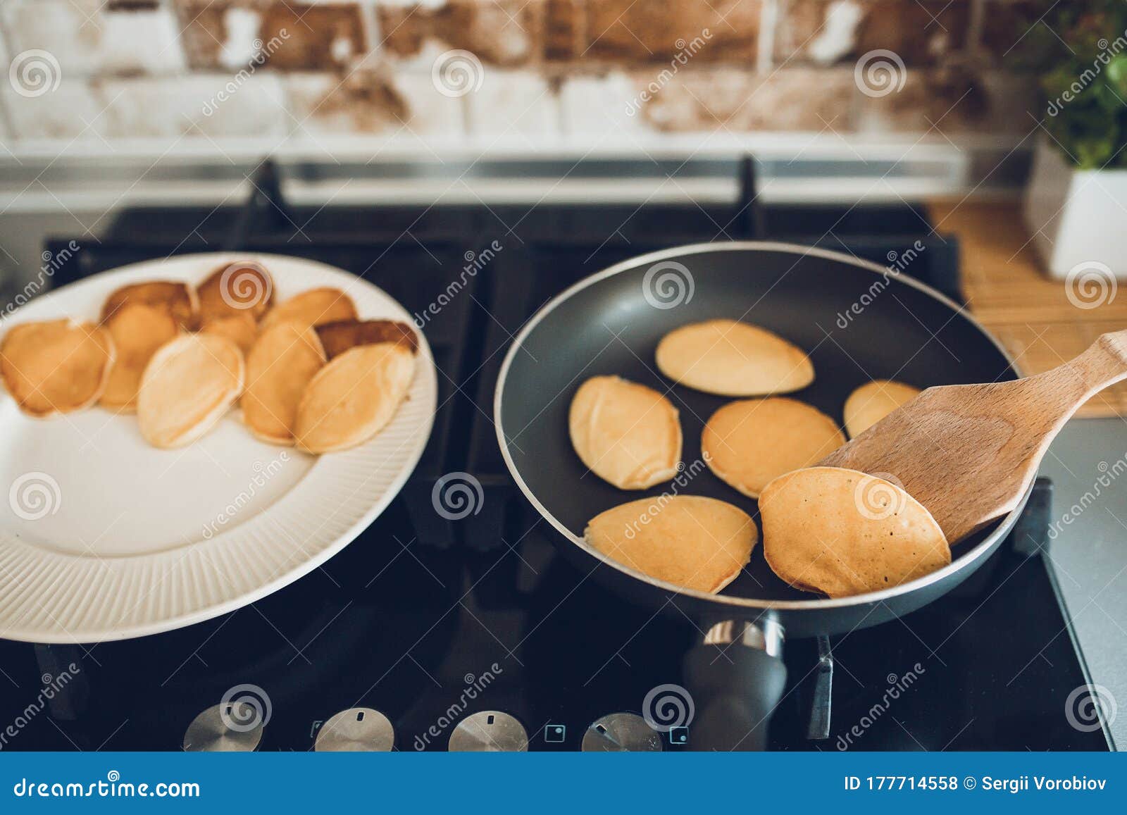 Baking Pancakes in Modern Kitchen. Steps of Making Cooking Pancake at