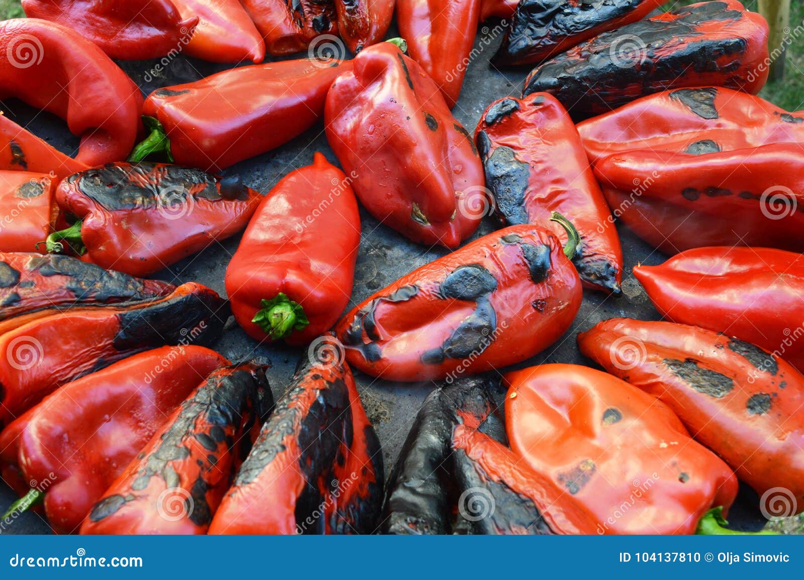 Baking peppers on a stove stock photo. Image of stove 104137810