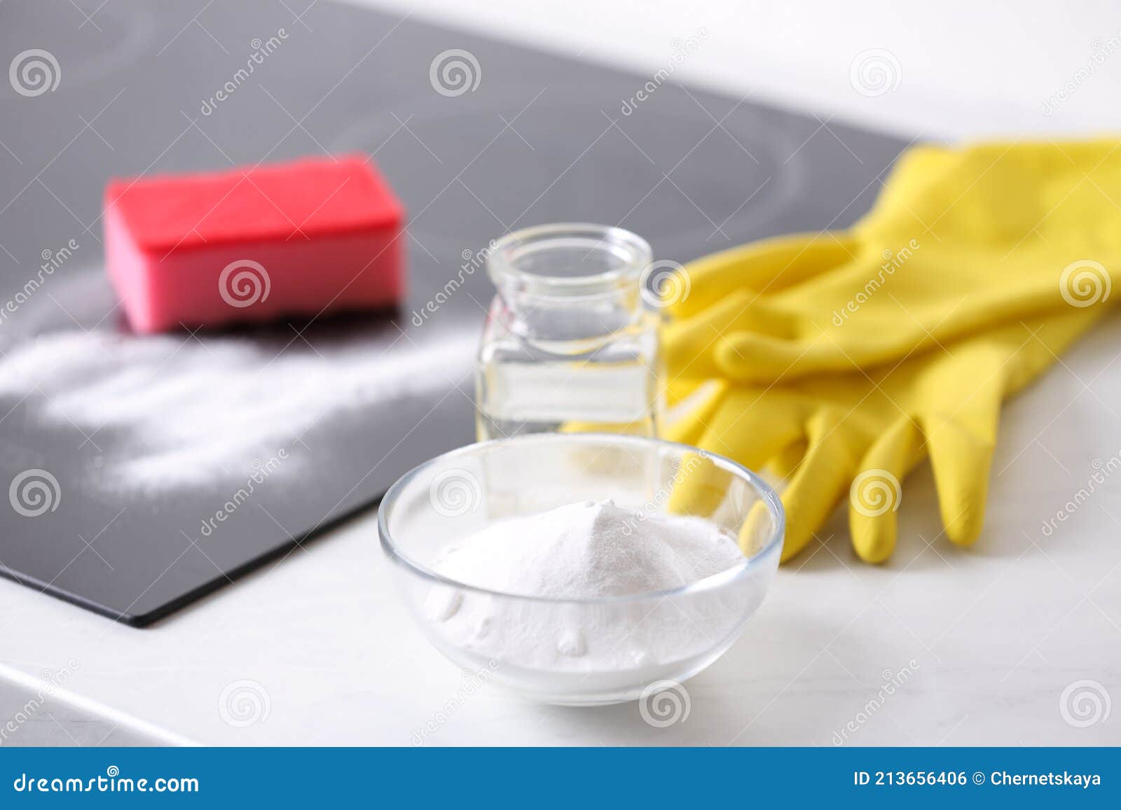 Baking Soda, Vinegar and Gloves on White Table. Eco Friendly Detergent