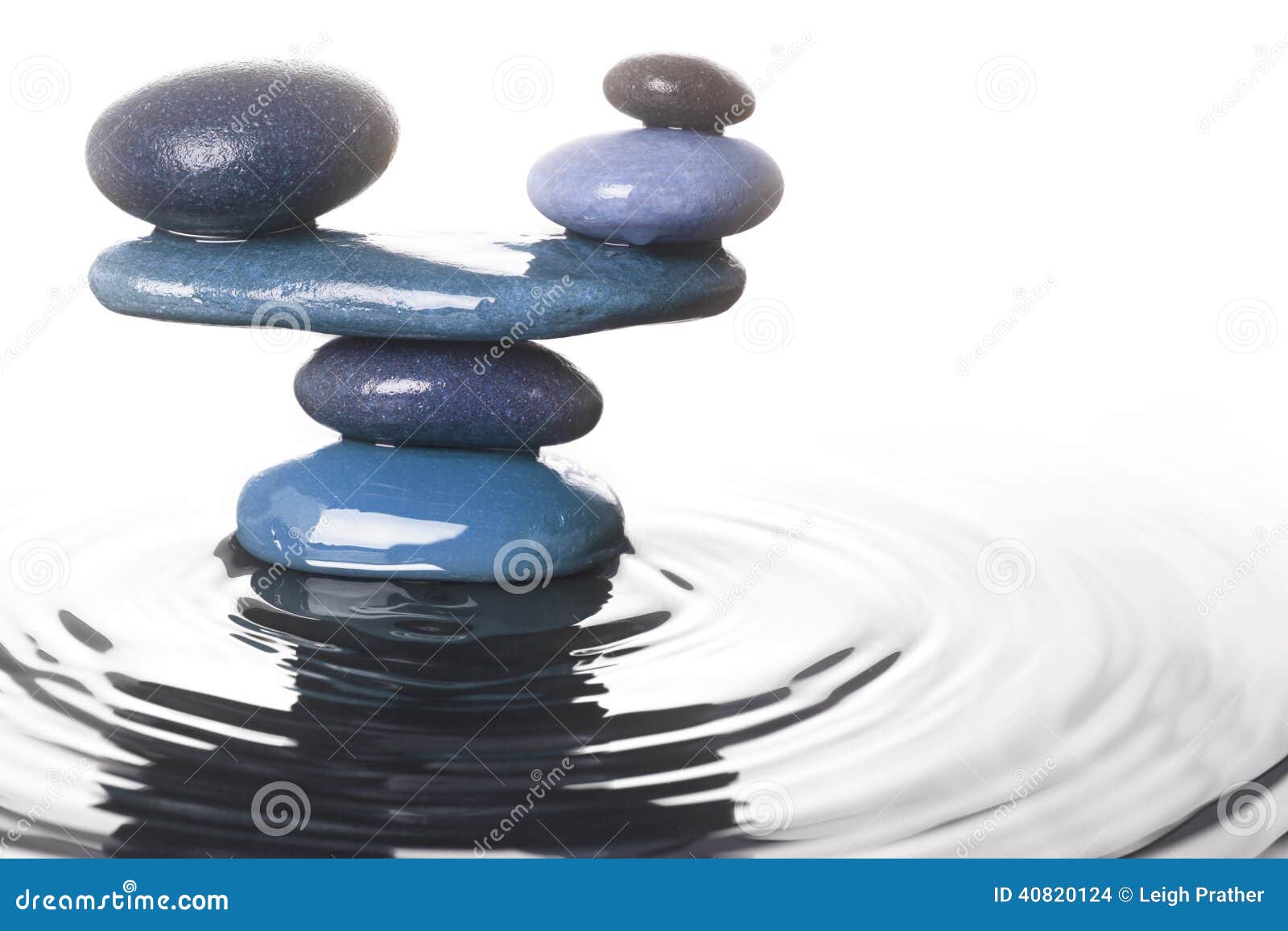 balanced stones in water