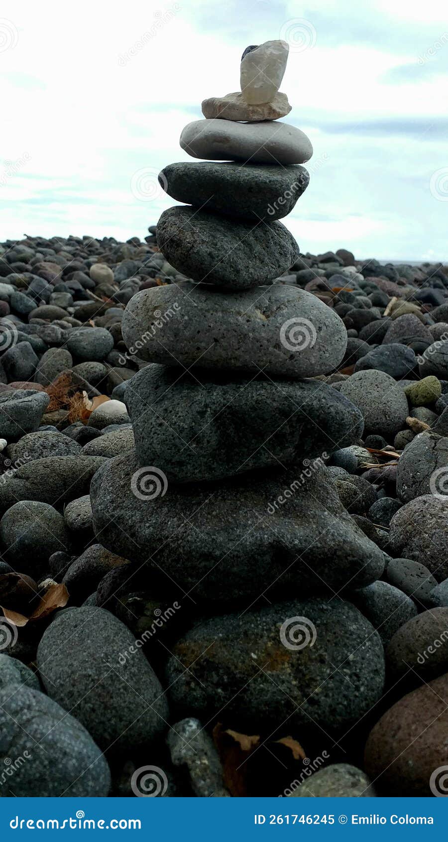 balancing stones in the beach