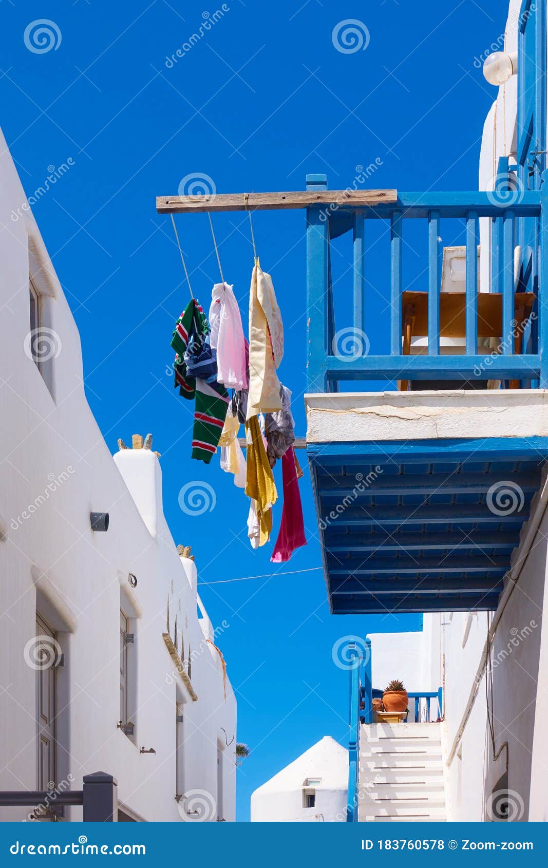 Balcony with Airing Clothes in Mykonos Stock Photo - Image of island ...