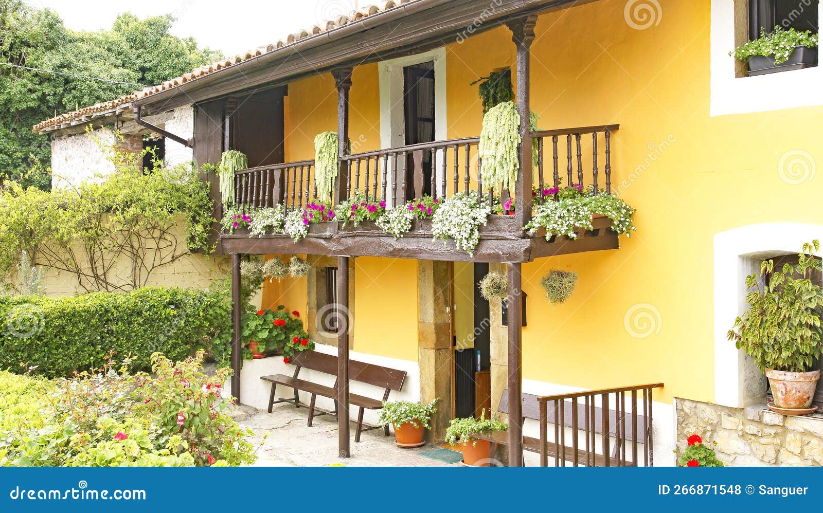 balcony with flower pots in principado de asturias