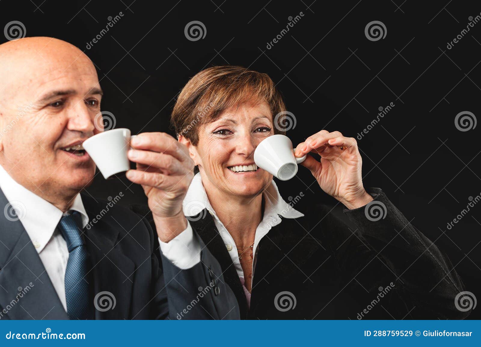 bald gentleman, red-haired lady espresso in europe