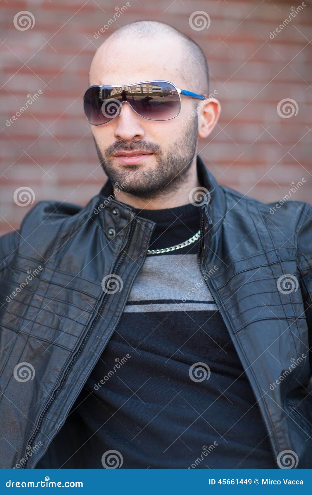 bald guy leather jacket