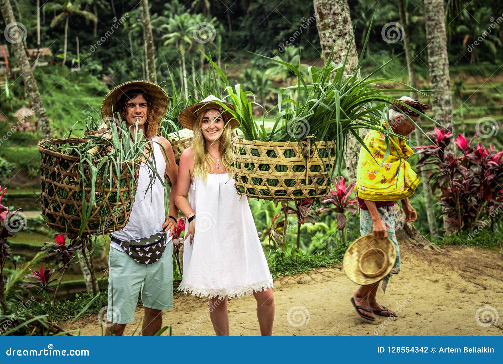 BALI, INDONESIA - AUGUST 24, 2018: Young Honeymoon Couple on Rice