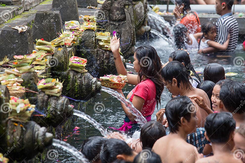 Balinese Families Come To The Sacred Springs Water Temple Of Tirta 