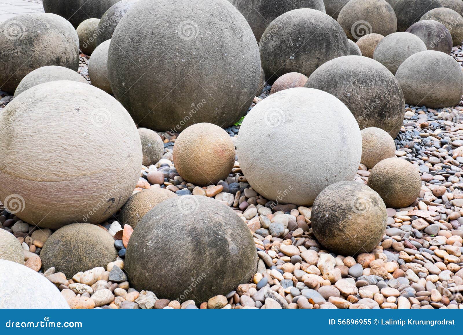 Ball rock in public garden stock image. Image of grey 56896955