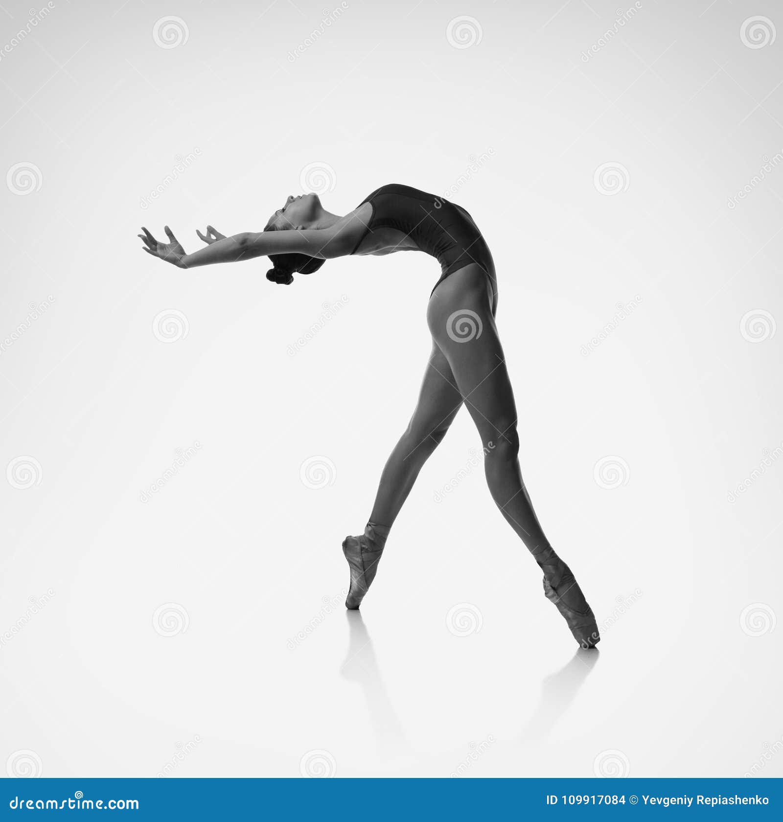 Ballerina Bends Back Through The Bench Stock Photo | CartoonDealer.com ...