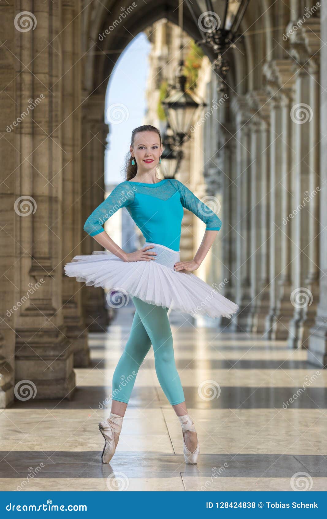 young dancer with tutu and turqoise trikot