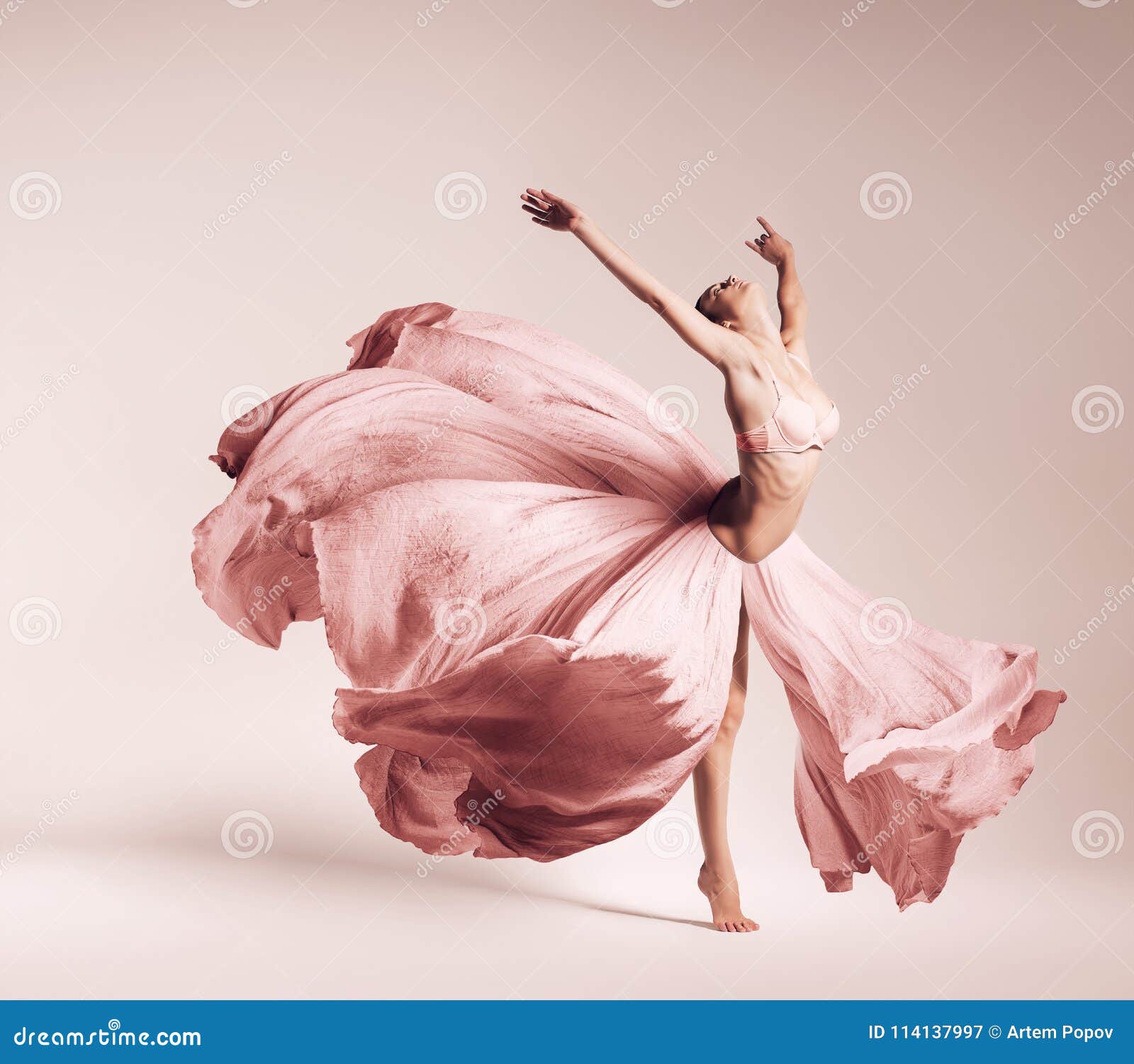 Ballerina Dancing in Flowing Pink Dress ...