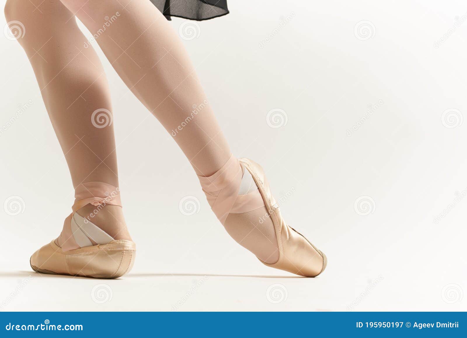 ballerina`s legs correct positioning of legs movement exercise tutu pointe shoes model