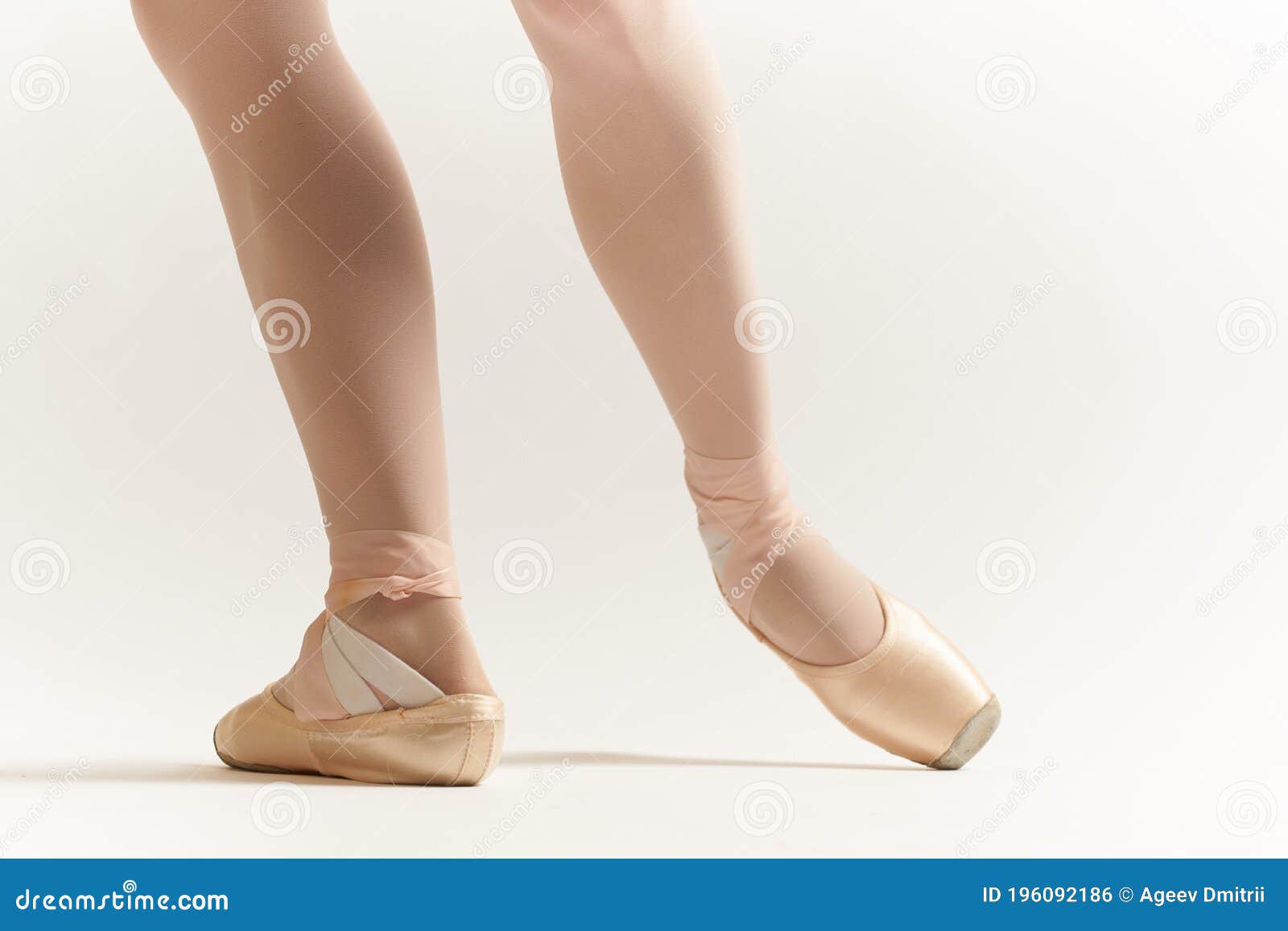ballerina`s legs correct positioning of legs movement exercise tutu pointe shoes model