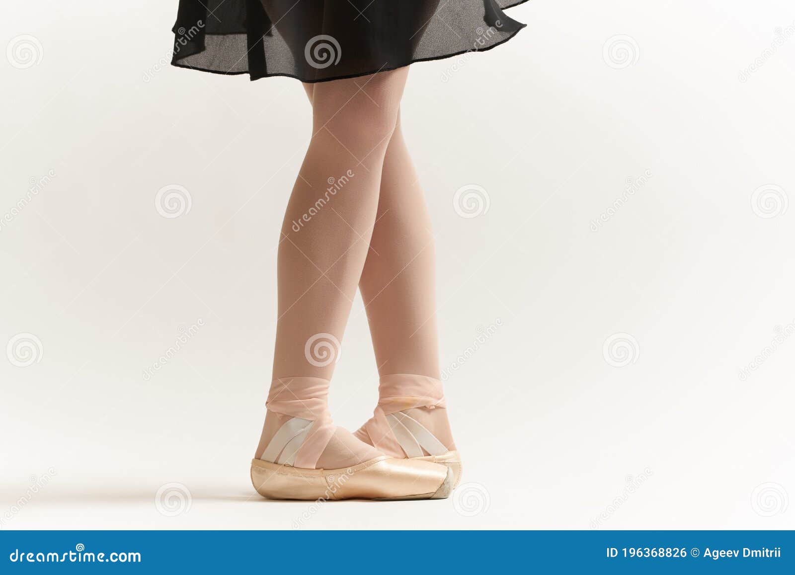 ballerina`s legs correct positioning of legs movement exercise tutu pointe shoes model