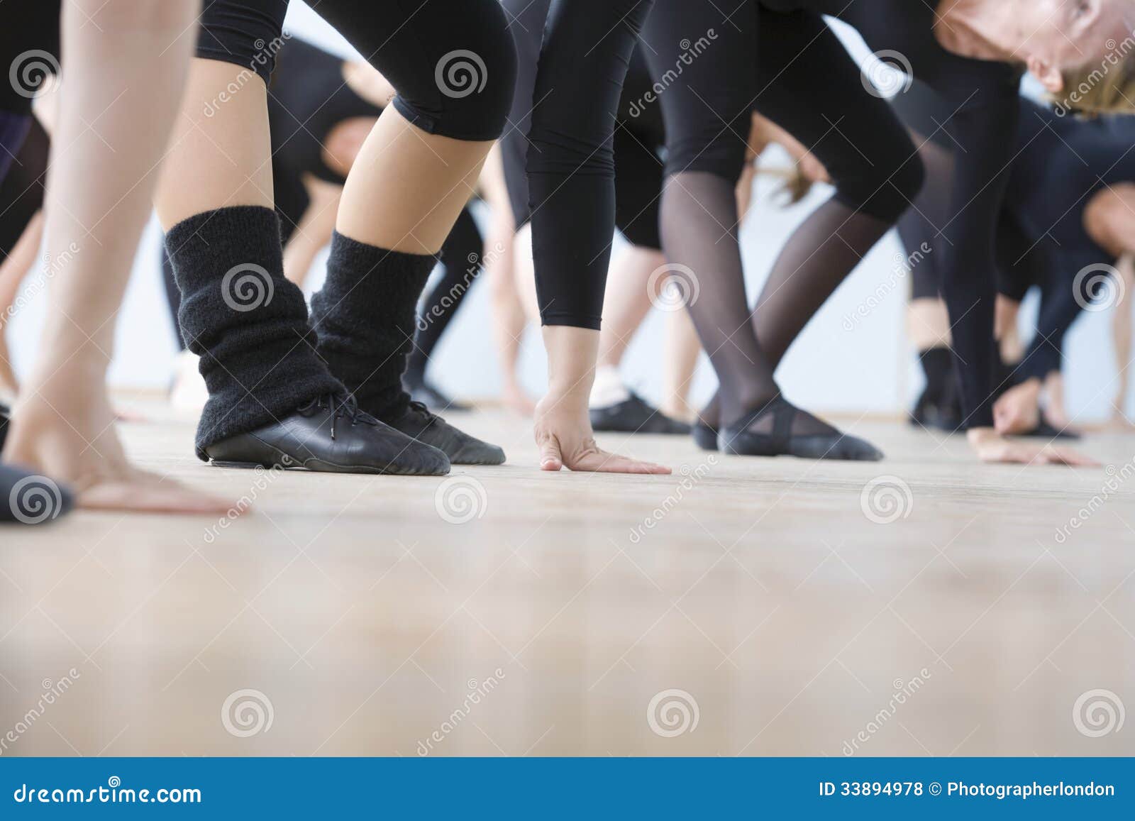 ballet dancers practicing in rehearsal room