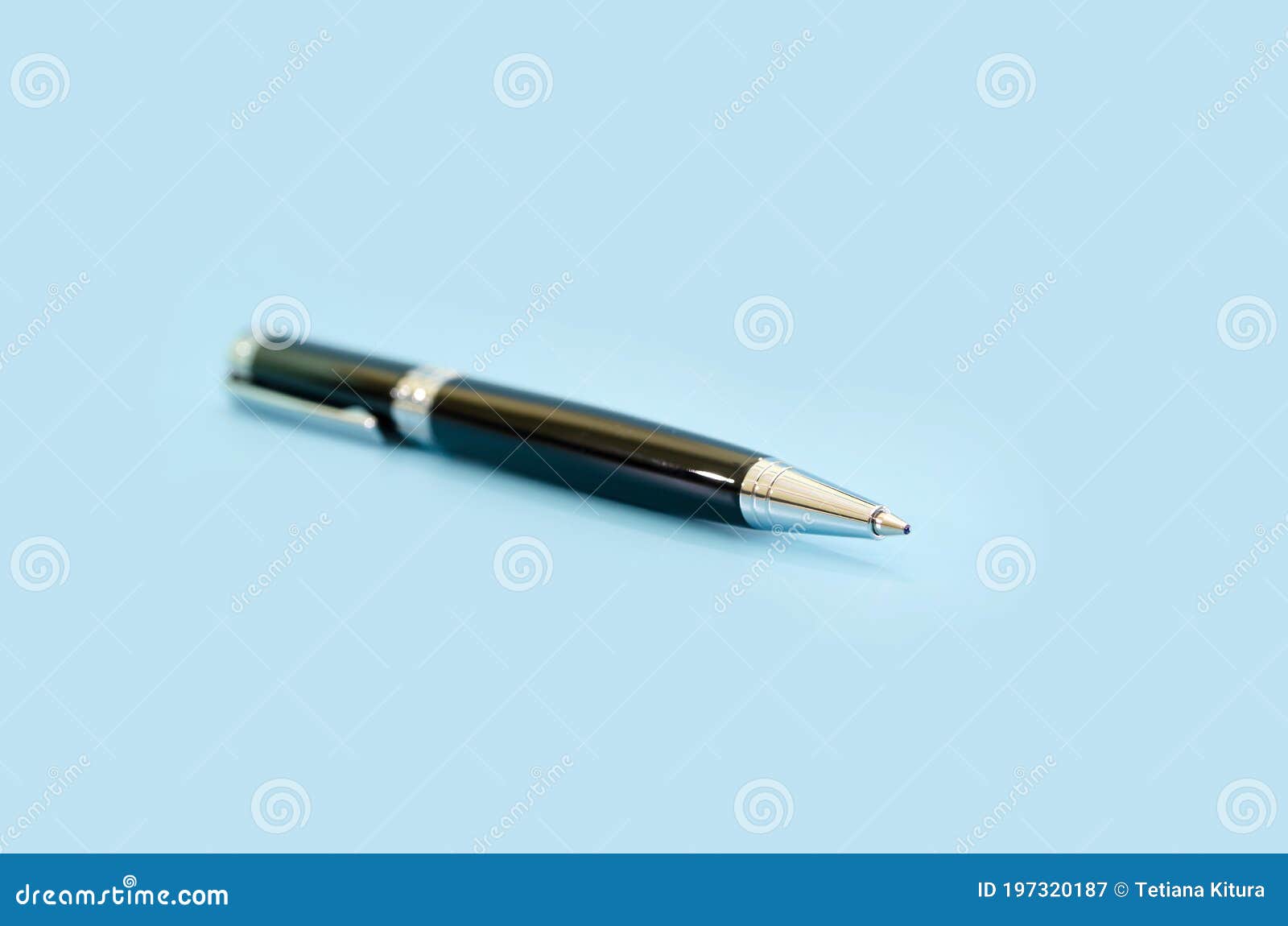 Black Ballpoint Pen on a Blue Background. Stock Image Image of