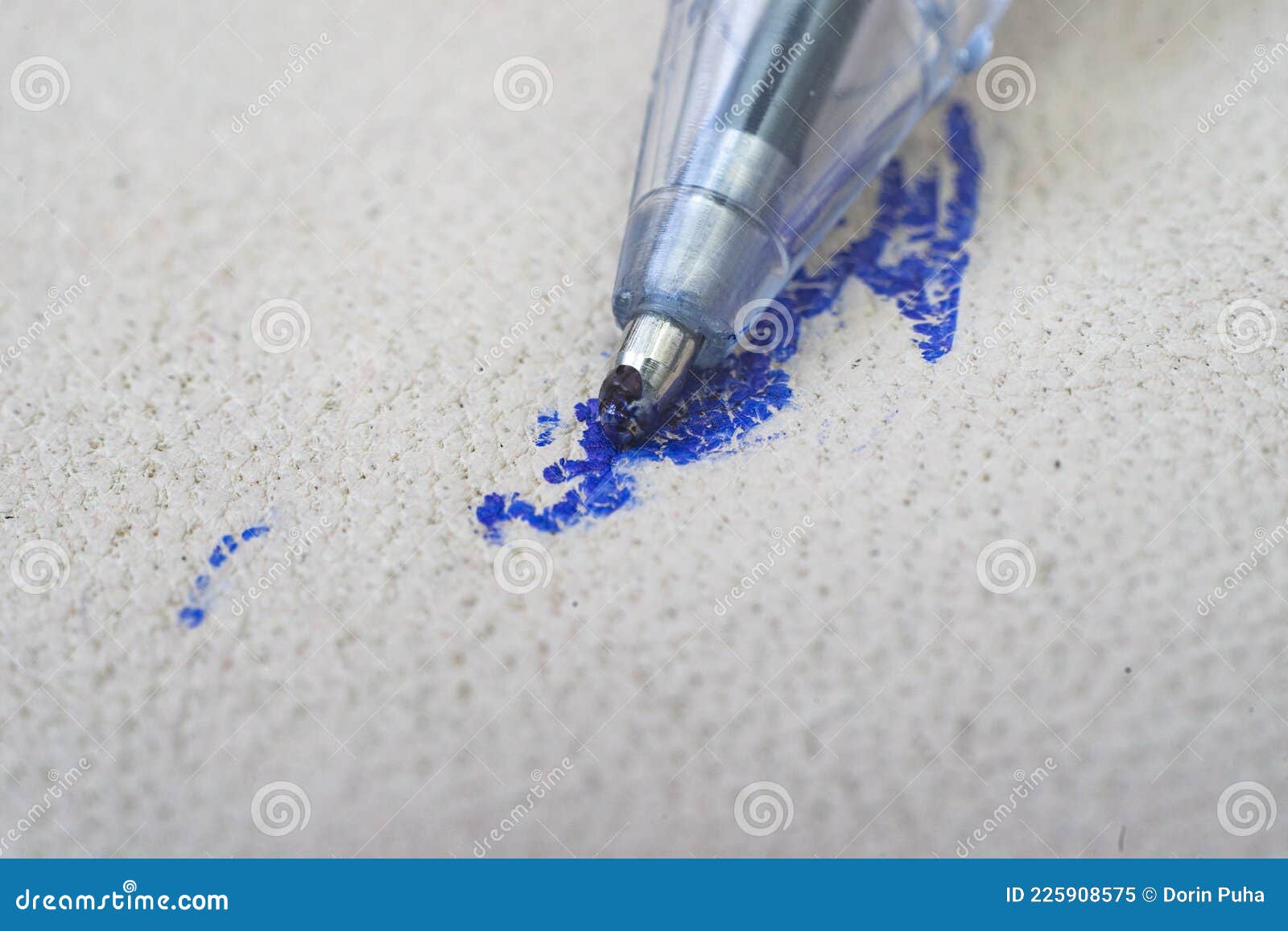 ballpoint pen tip, scribbling on a white leather sofa, or car seats.