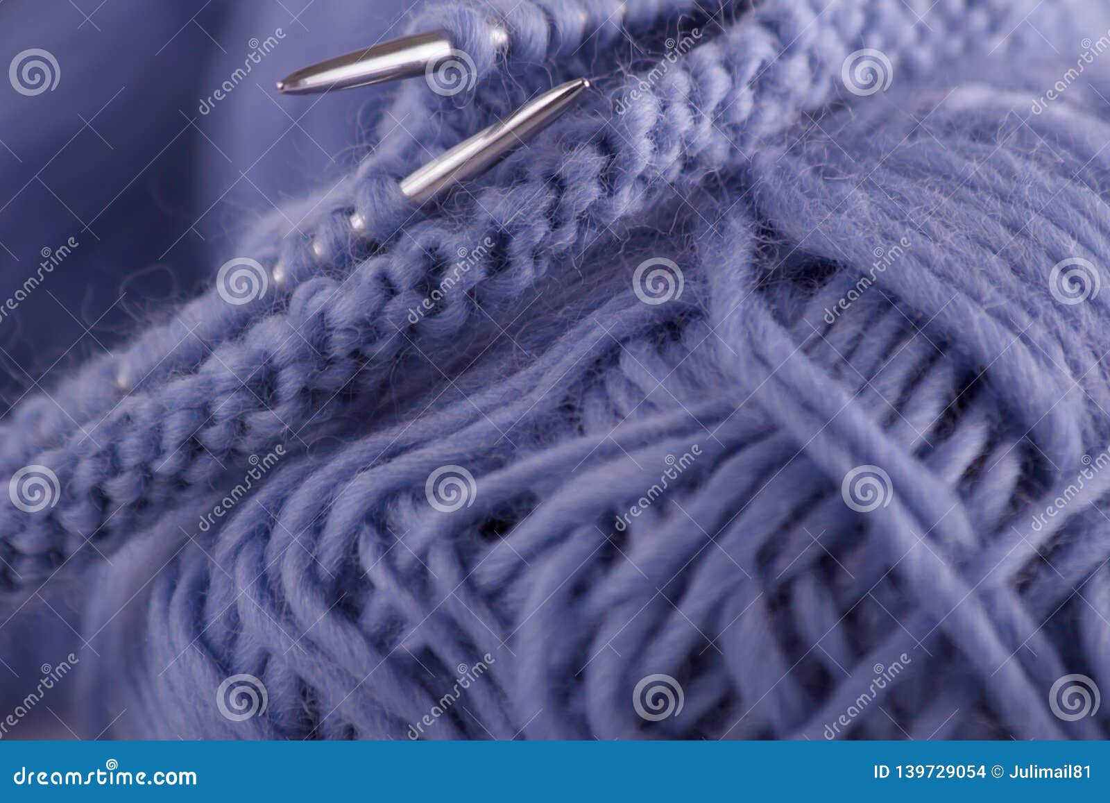 Close-up on the Balls of Blue Knitting Yarn, Knitting Needles and ...
