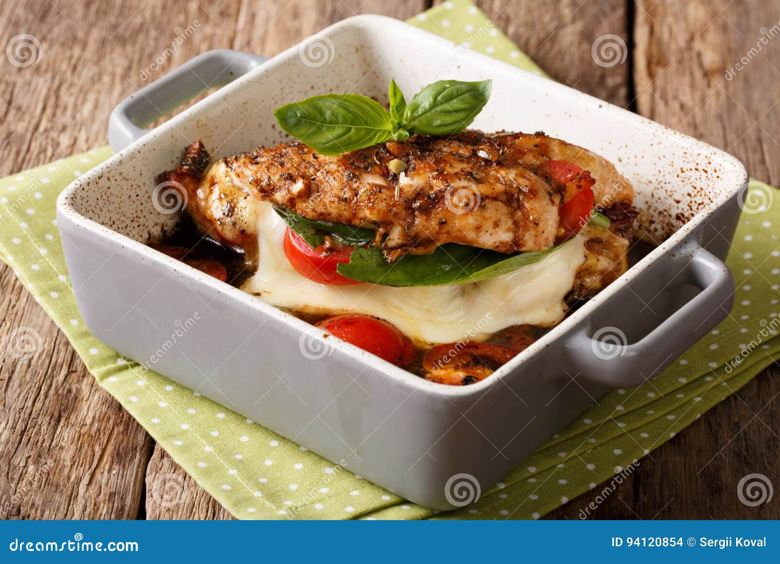 Balsamic Chicken Stuffed with Caprese Closeup in a Baking Dish. Stock