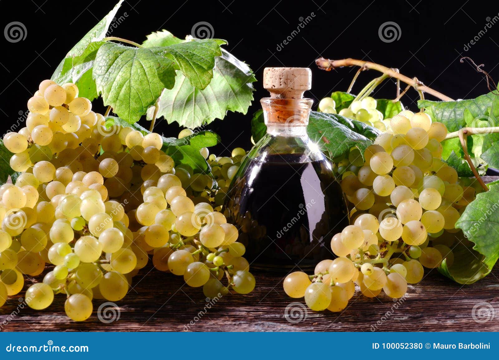 Balsamic Vinegar and White Grapes Stock Photo Image of vinegar, wood 100052380
