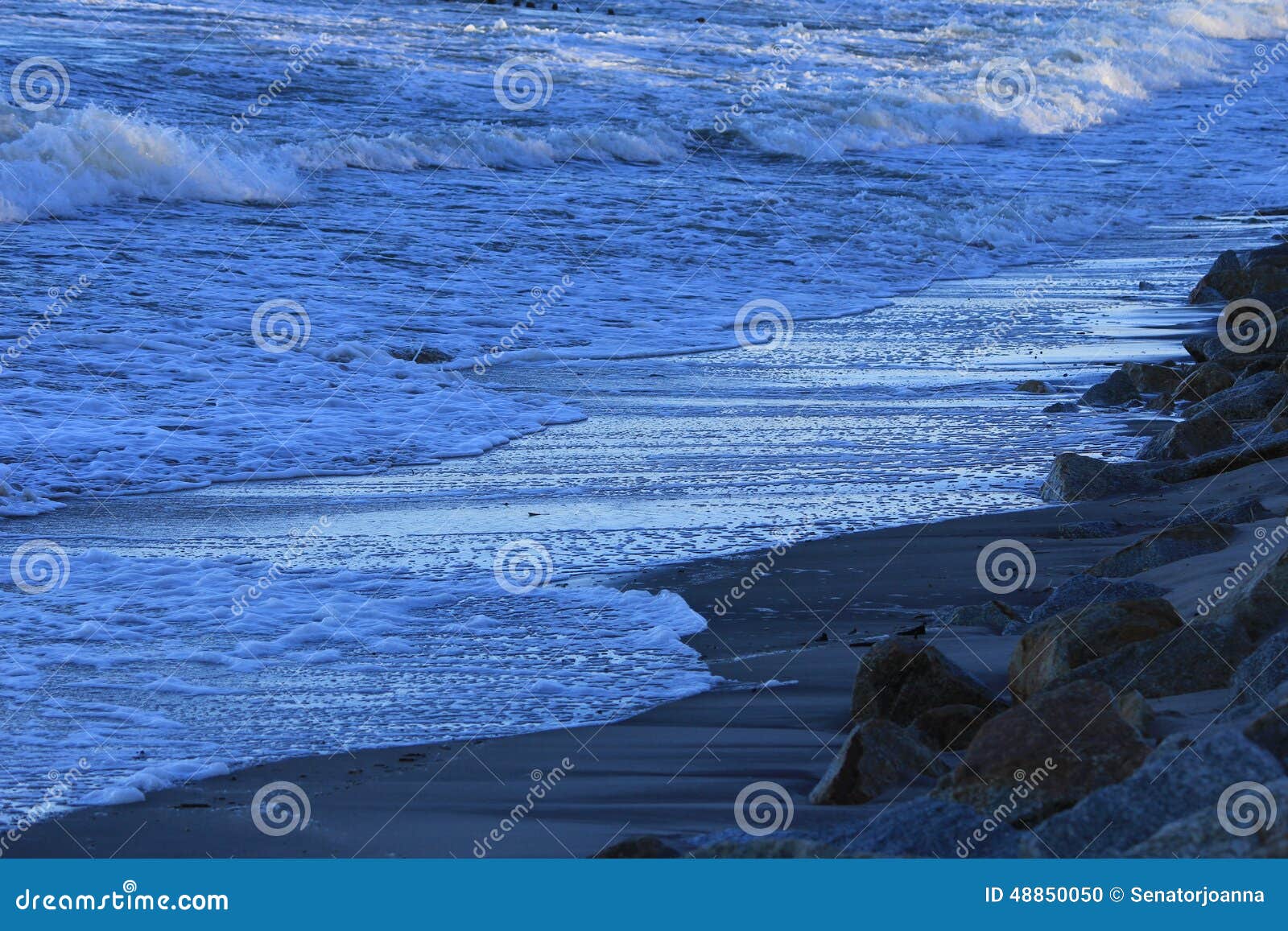 Baltic sea in the winter in Poland - waves, beach, sea water. Baltic sea in the winter in Poland - high waves, low temperature