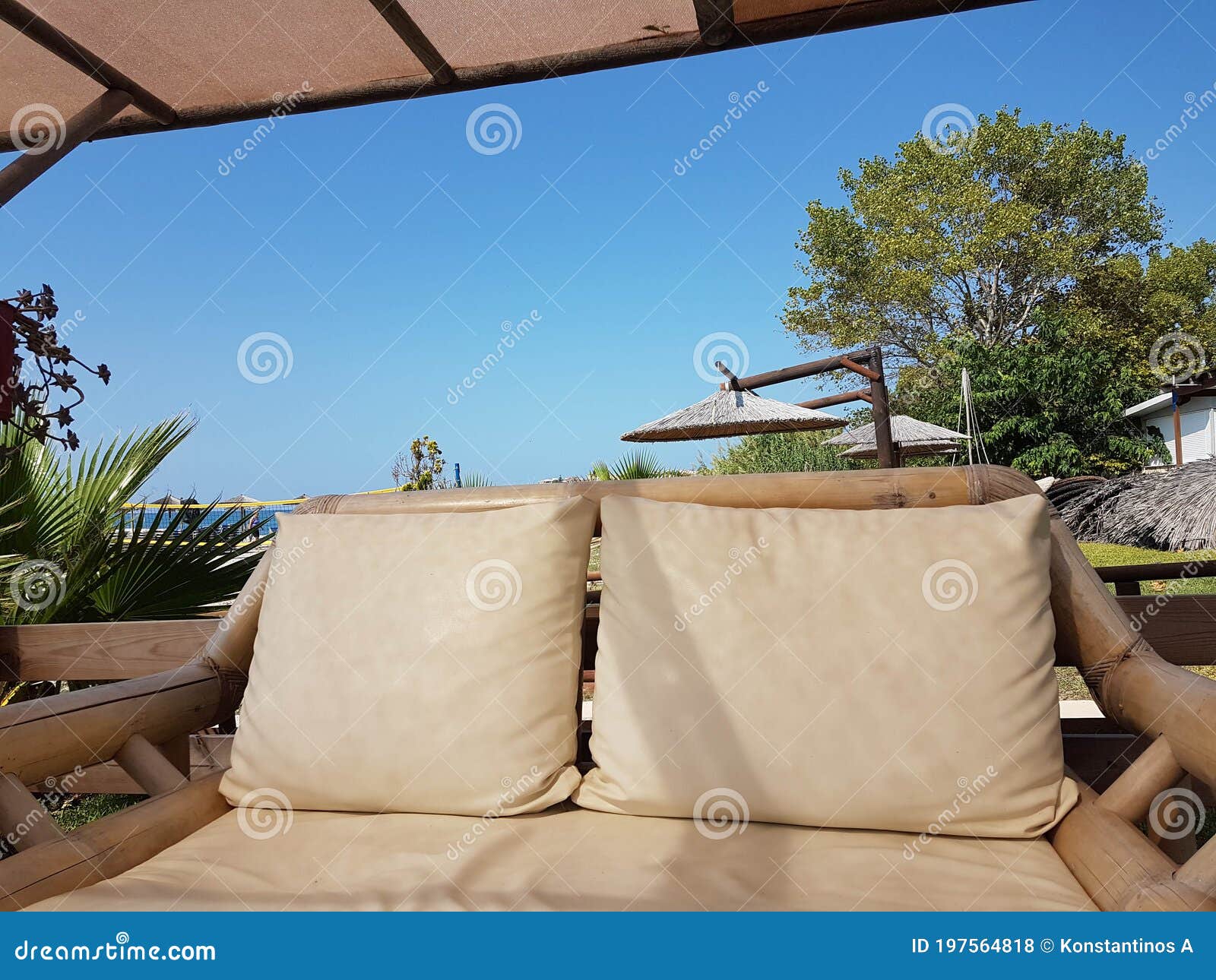 bamboo chair table in summer day by the beach