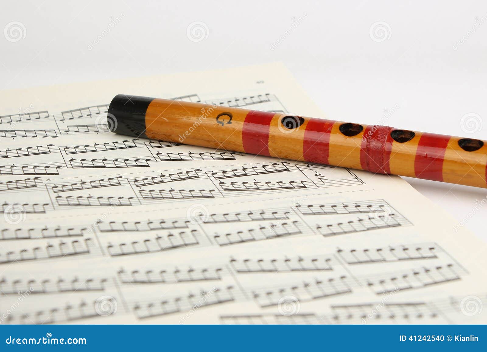 Bamboo Flute and Music Sheet Stock Photo Image of tone, musical 41242540