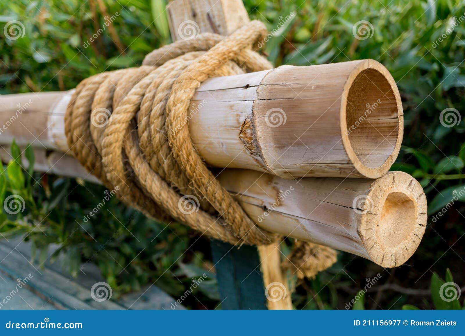 Bamboo Poles Tied by a Thick Rope Stock Image - Image of panel, background:  211156977