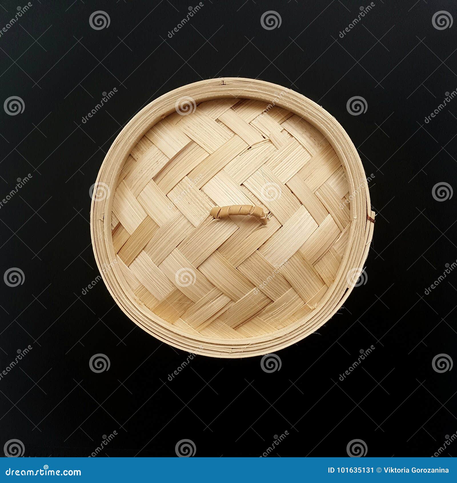 Bamboo Steamer for Dumplings. Isolated on Black. Photo Flat Lay. Stock