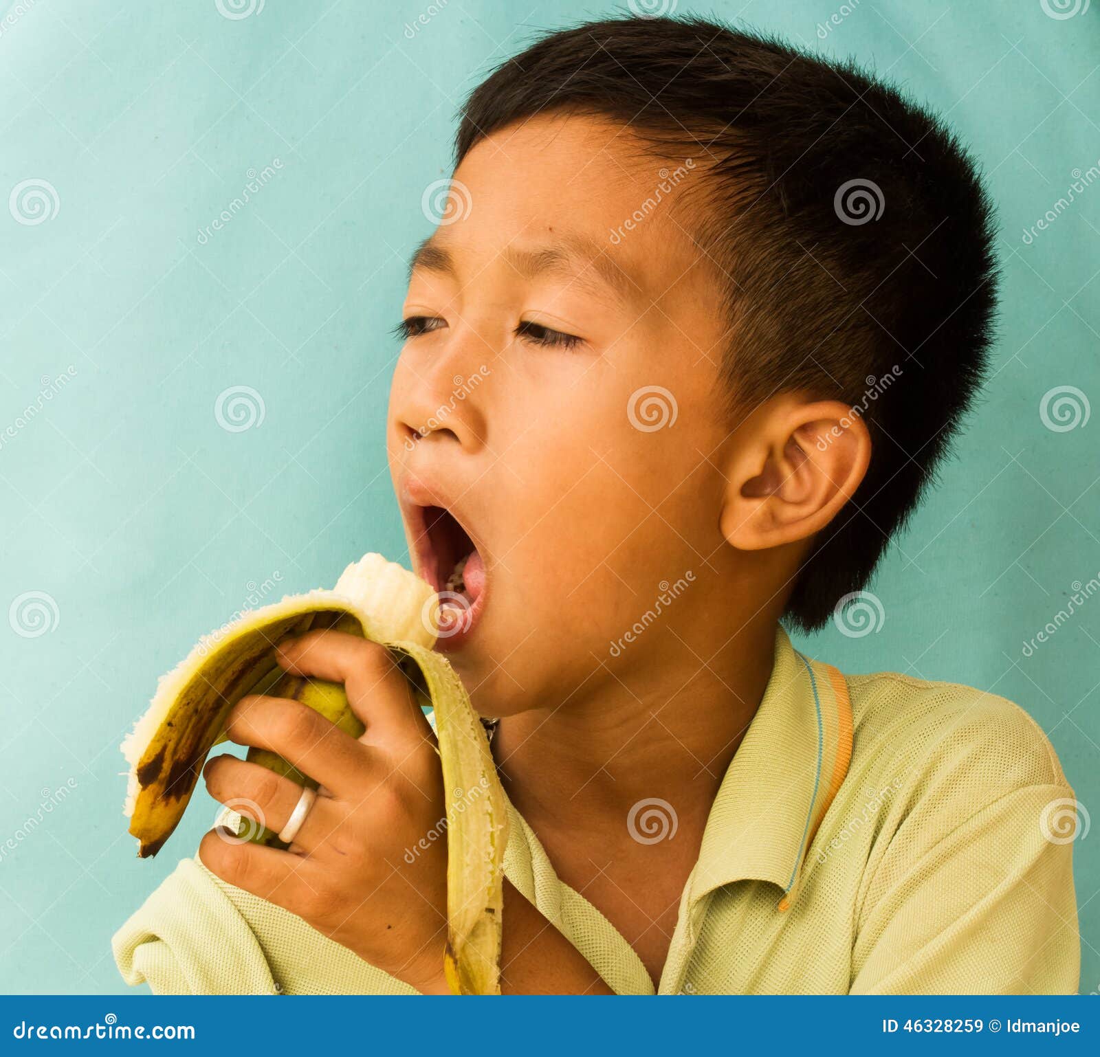 Banana eating stock image. Image of asian, playing, child 46328259
