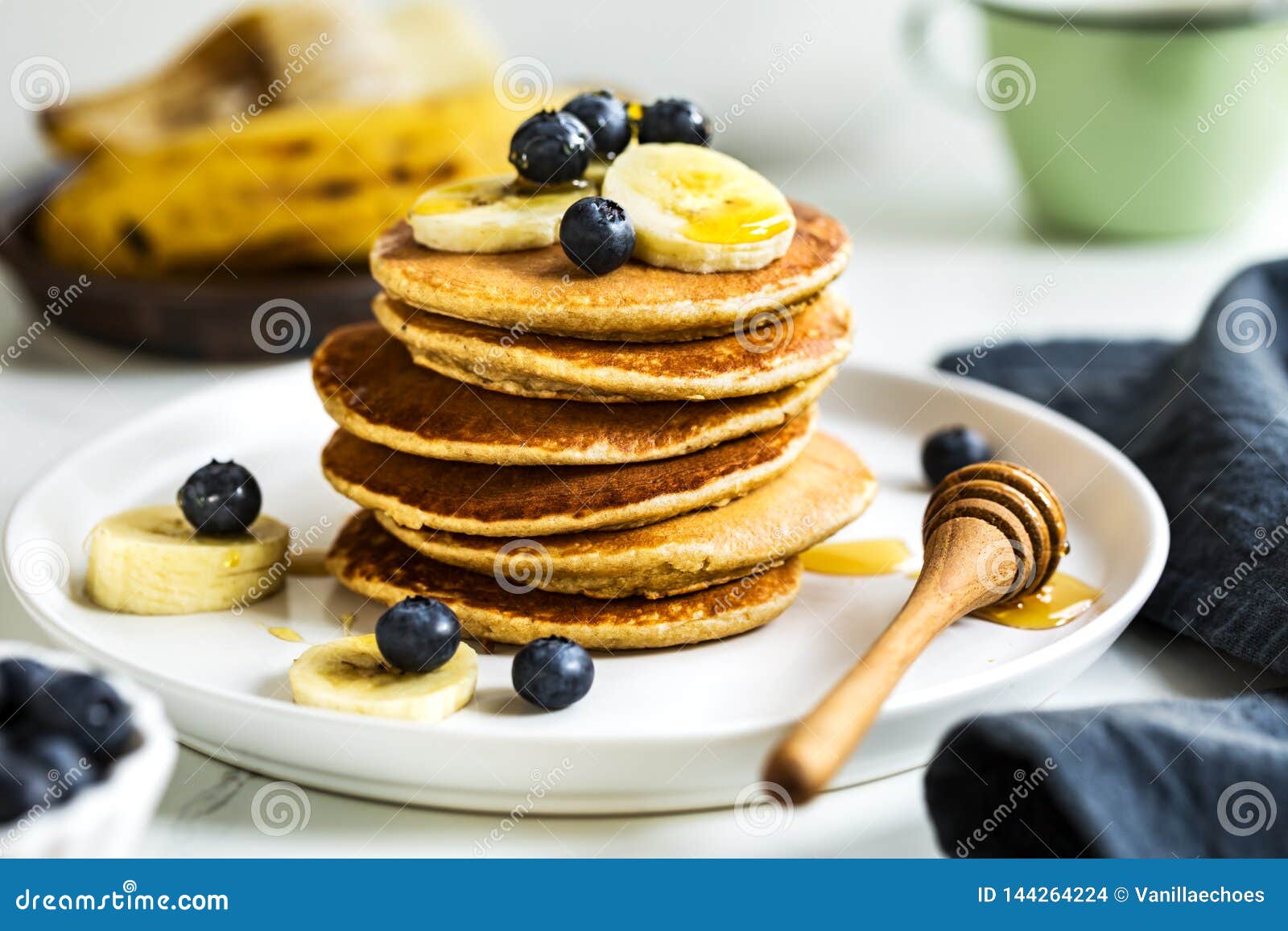 banana, oat pancakes with fresh blueberry and banana