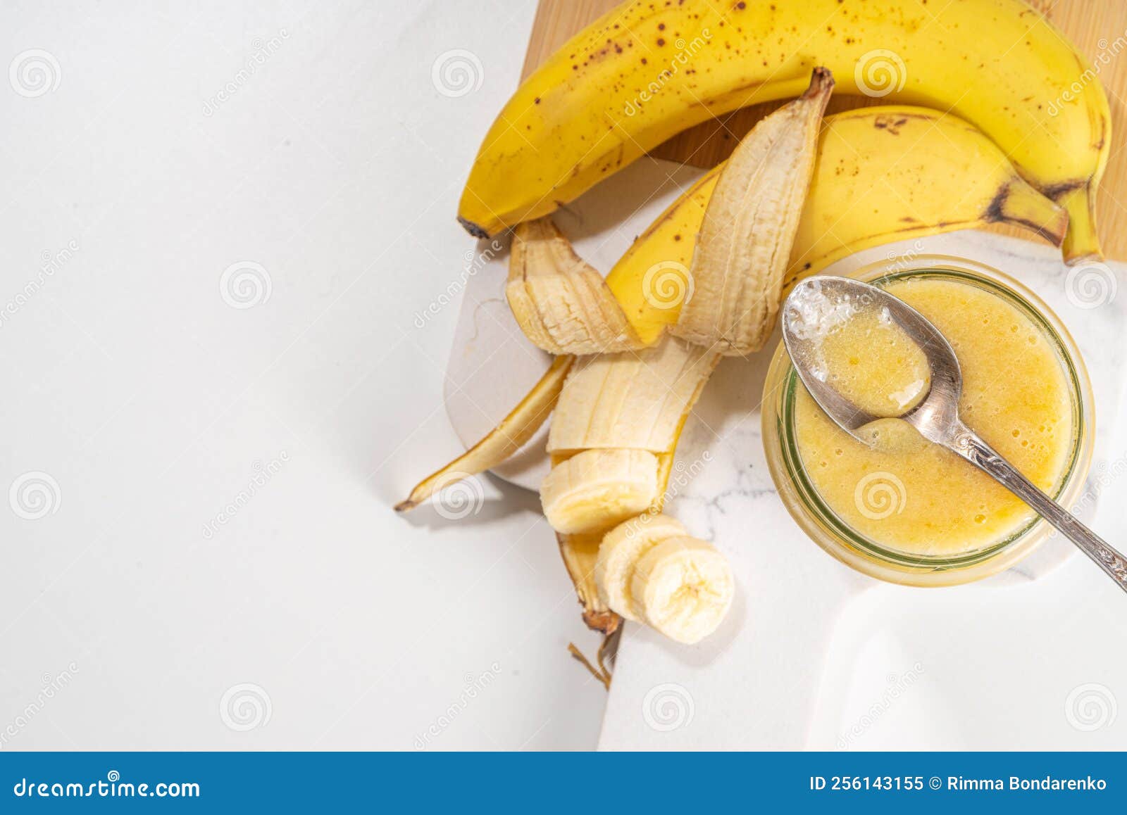 Bananas jam in small jar stock image. Image of summer 256143155