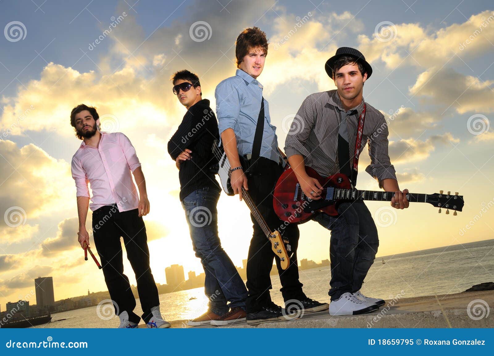 Band Of Young Male Musicians With Instruments Royalty Free Stock Photo