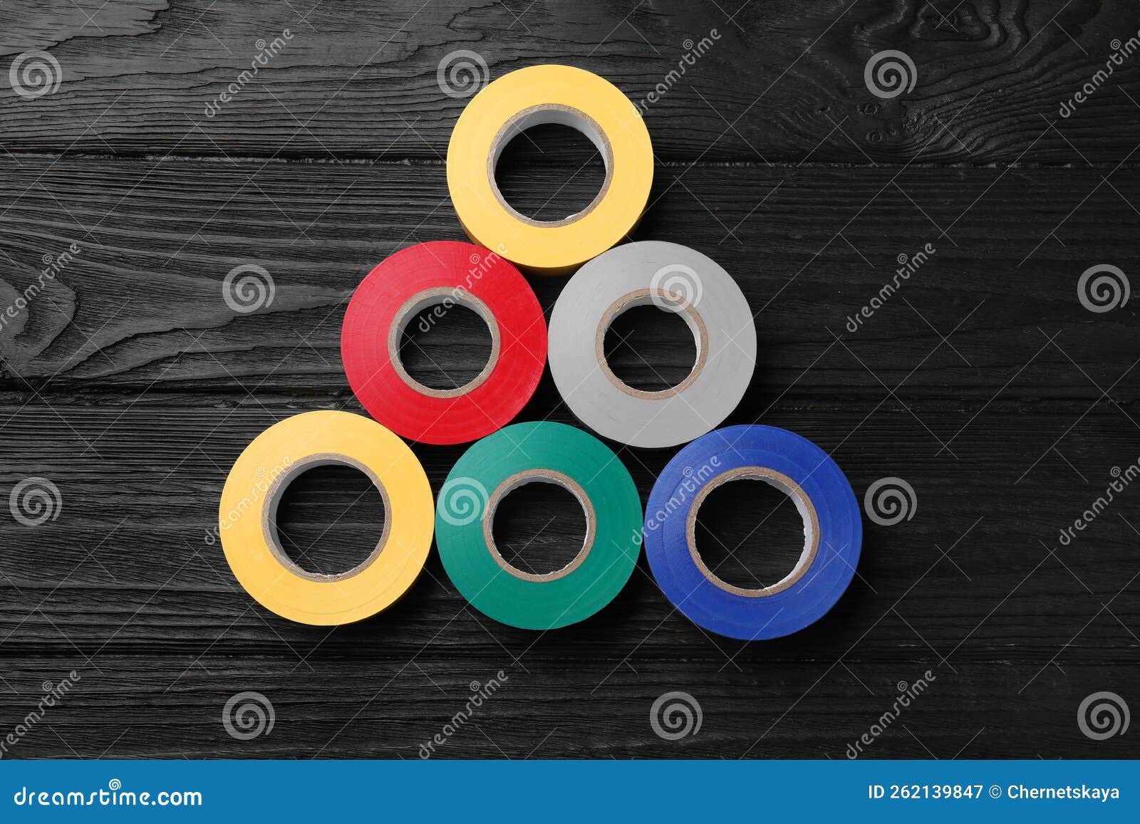 Bande Isolante Colorée Sur Table En Bois Noir Plate Image stock - Image du  emballage, configuration: 262139847