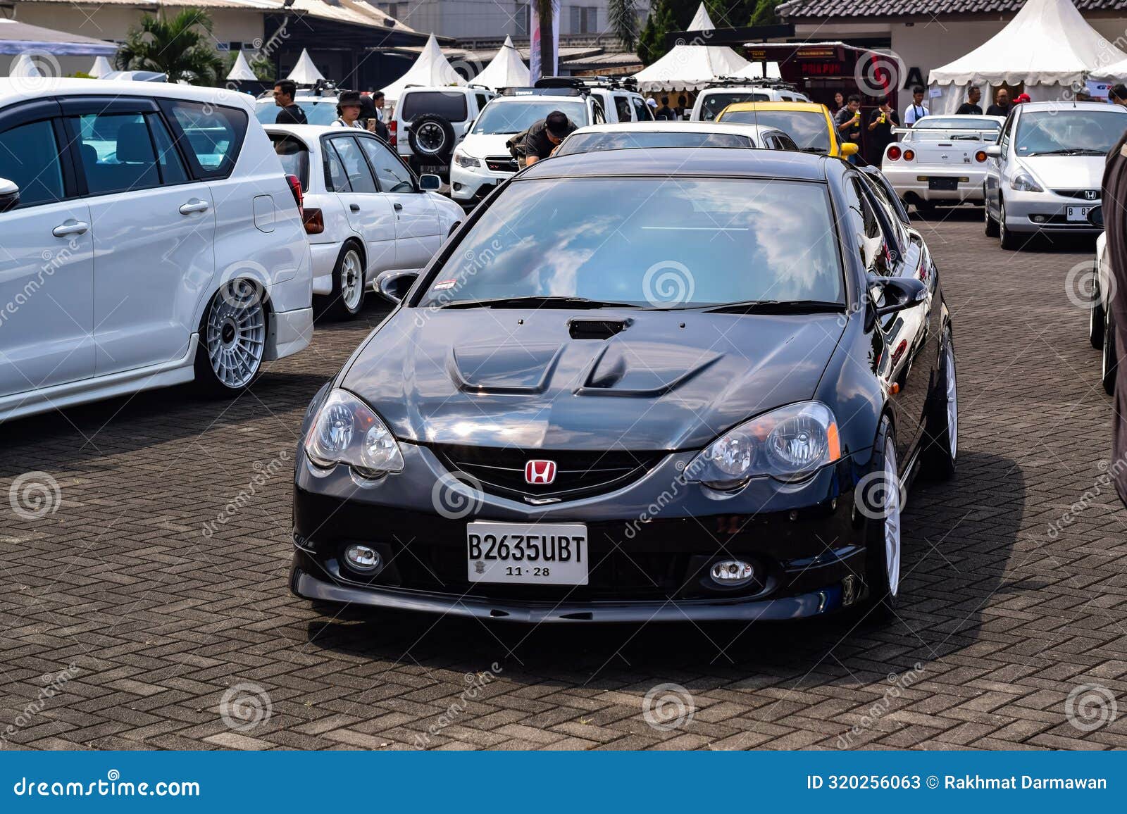 Black Honda Integra Type R Dc5 or Acura RSX in Jdm Fest 2024 Outdoor