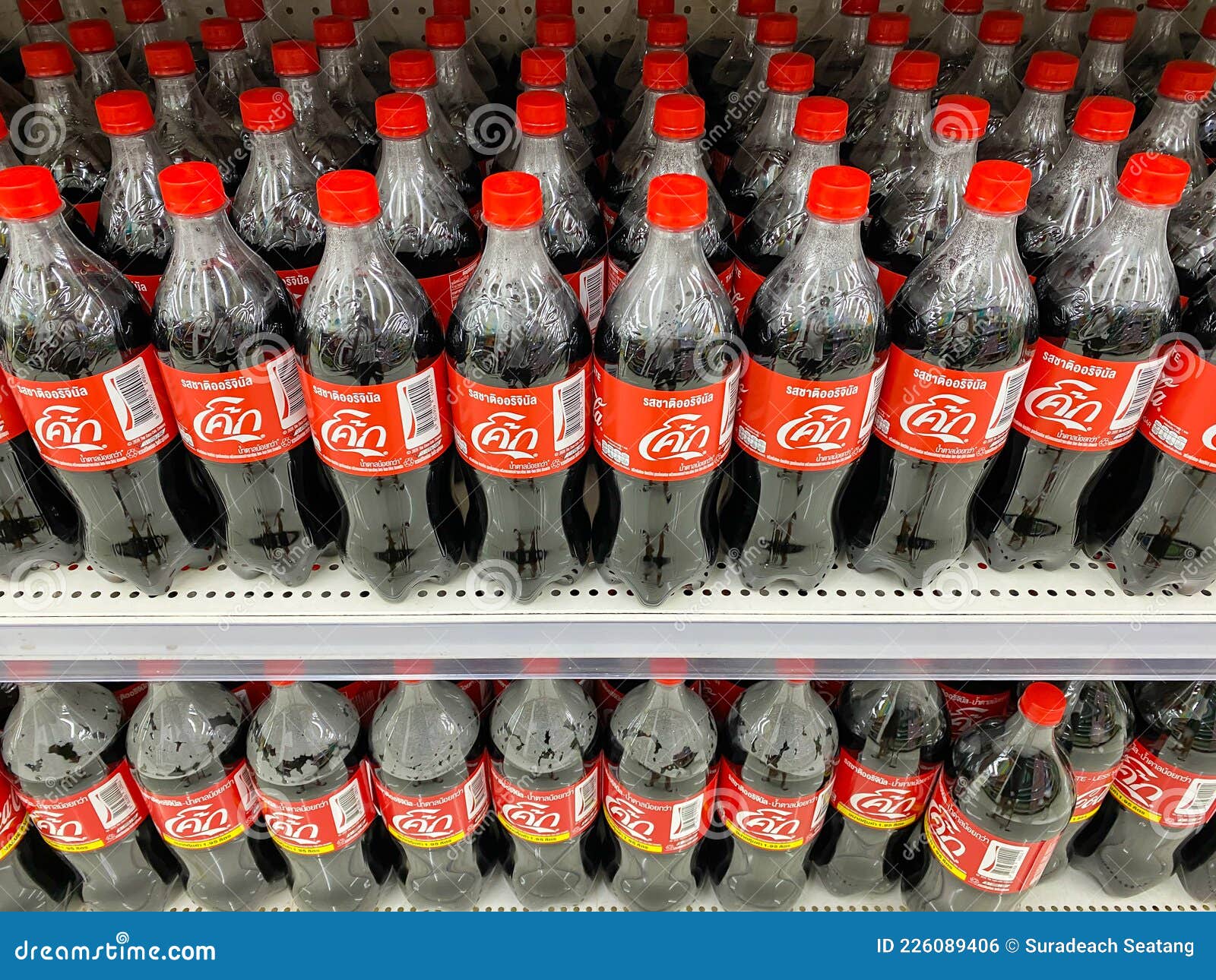 Bottles Of Coca cola Famous Drink In The Fridge Editorial Photo bottles-of-coca-cola-famous-drink-in-the-fridge-editorial-photo