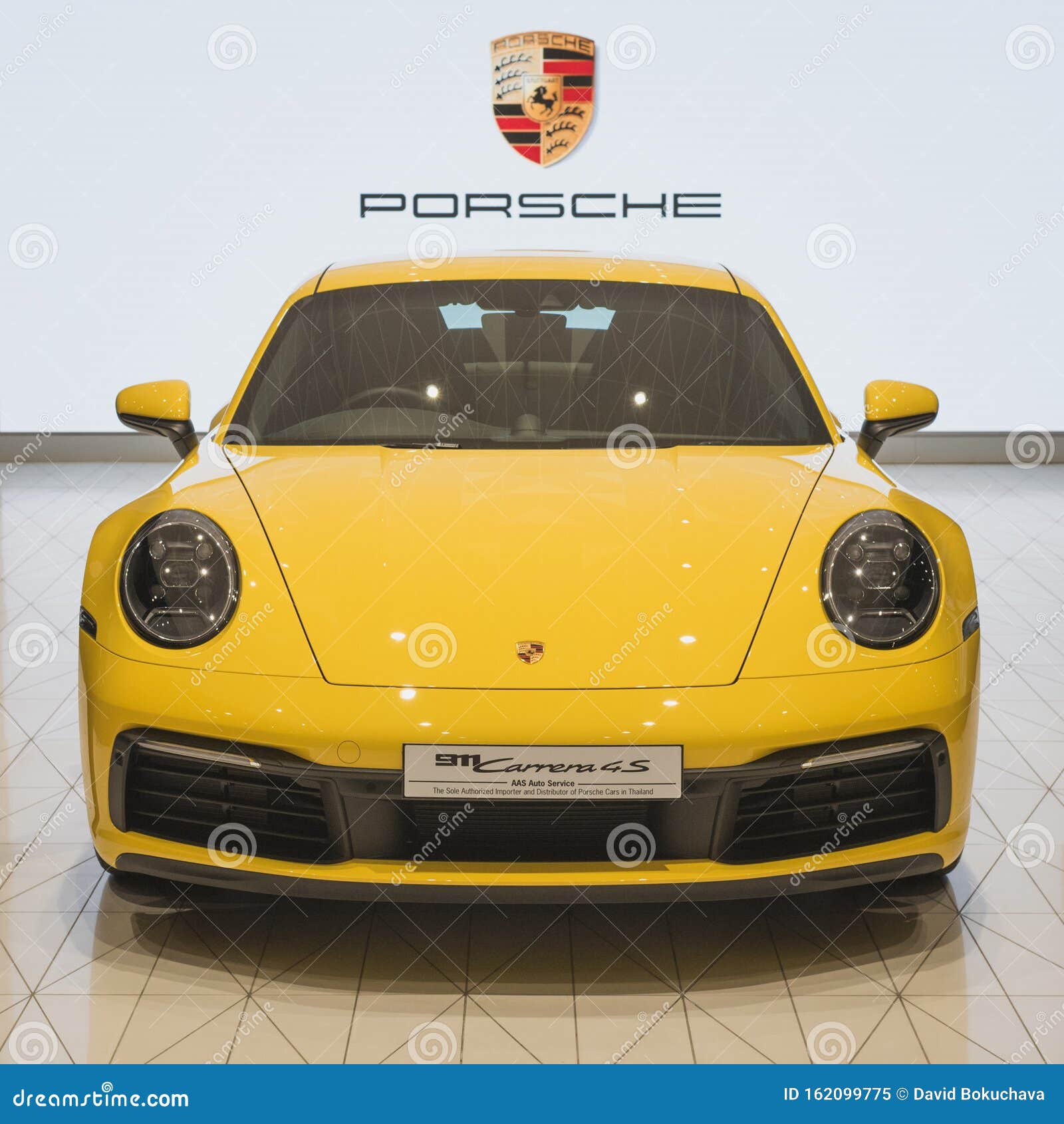 Bangkok, Thailand: the Front View of a Yellow Porsche 911 Carrera 4S  Editorial Image - Image of logo, june: 162099775