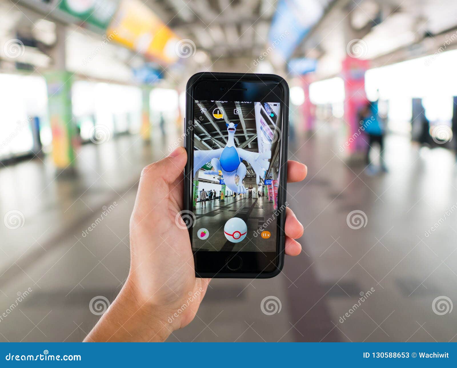 Apple Iphone 7 Held In One Hand Showing Its Screen With Pokemon Go Application Editorial Stock Photo Image Of Hand Iphone