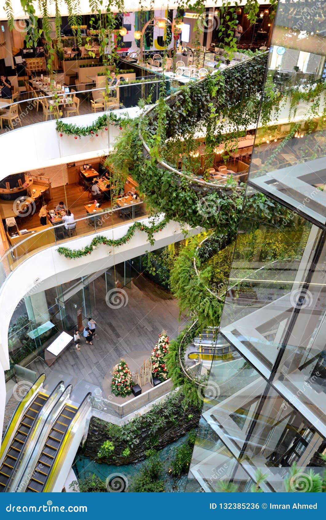 Green vertical interior design of Emquartier shopping mall dining