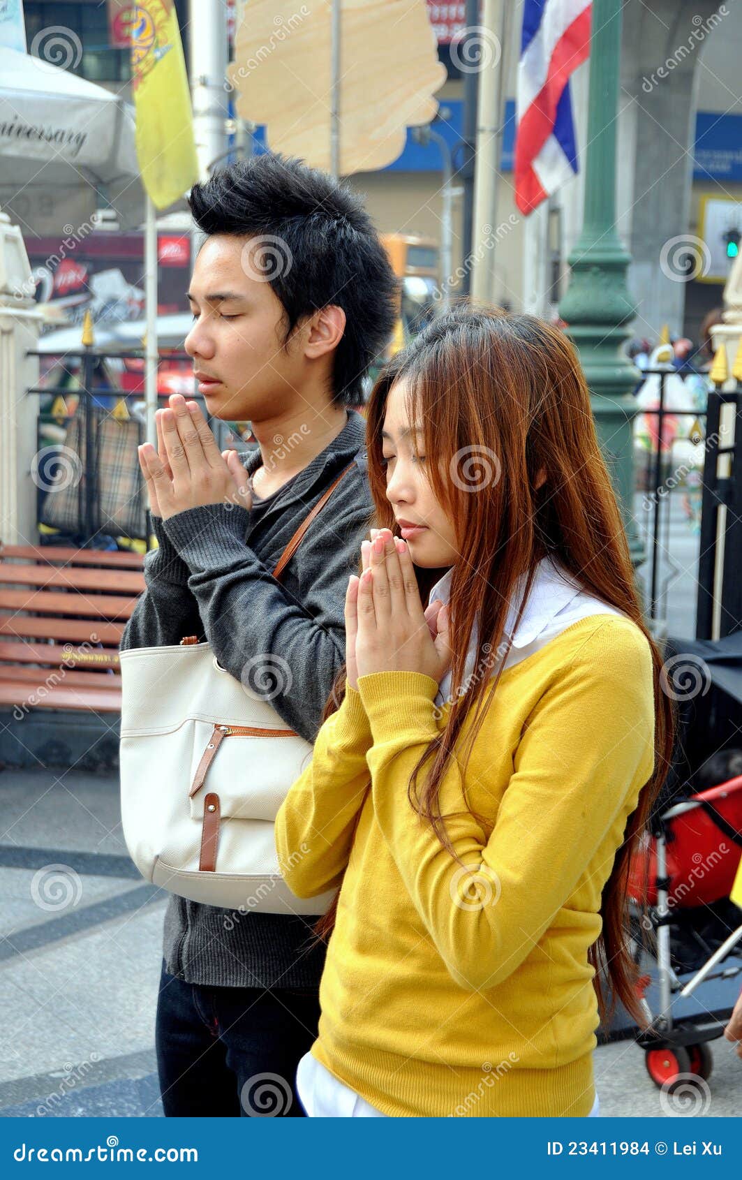 Bangkok, Thailand: Praying Couple At Erawan Shrine