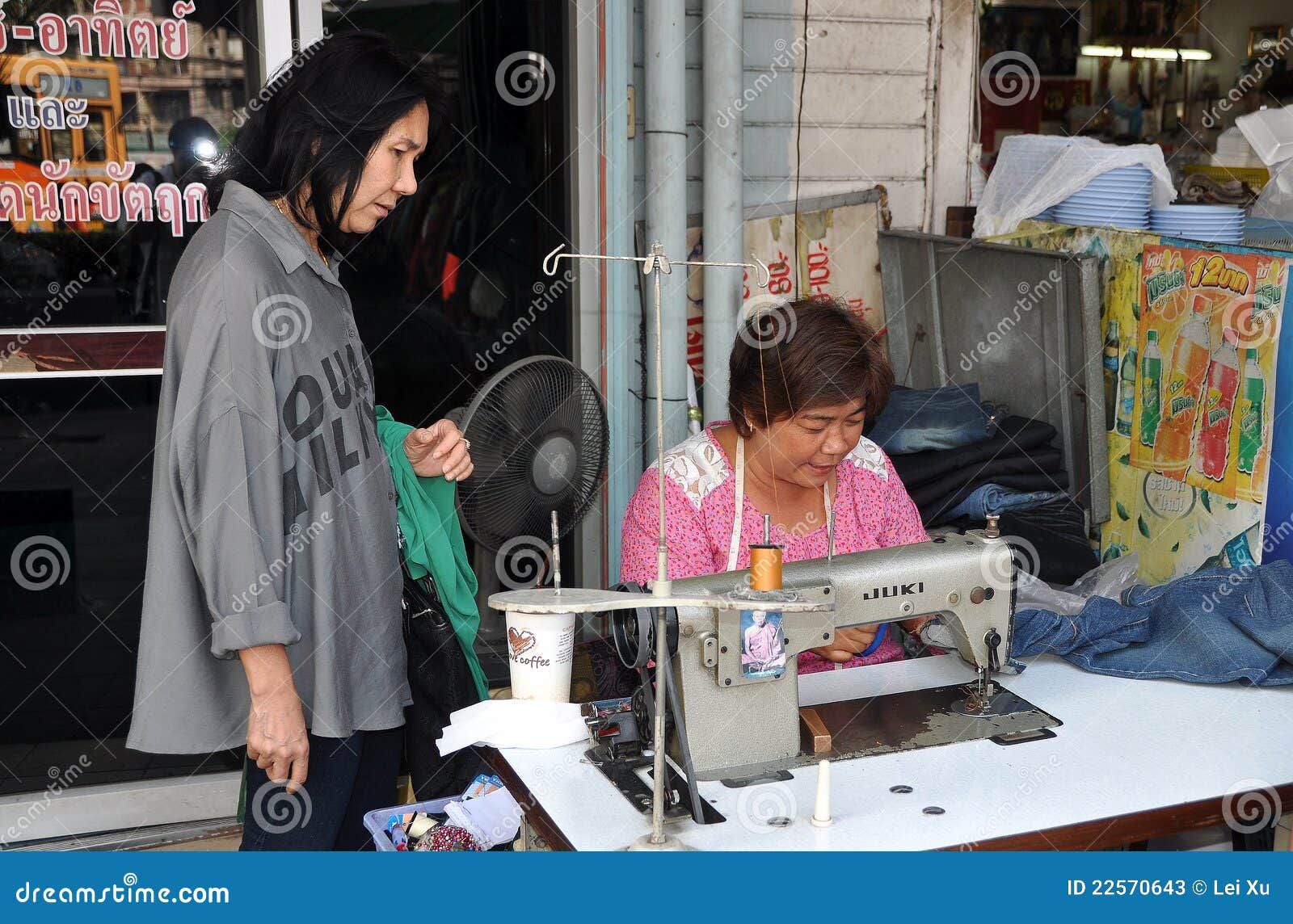Bangkok, Thailand Woman with Sewing Machine Editorial Stock Photo