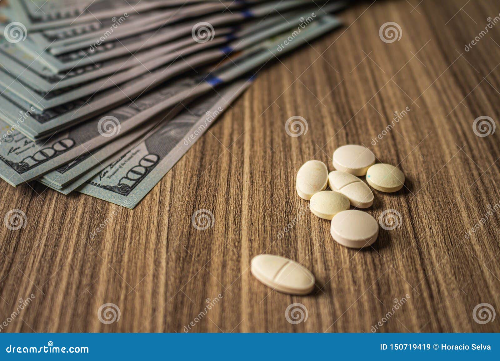 Banknotes And Medicines On A Desk Health Cost Concept Money And