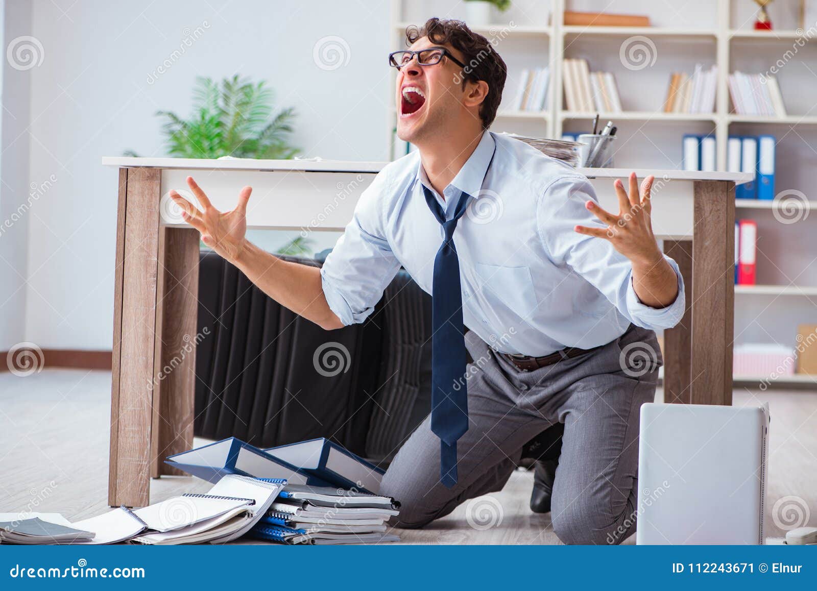 the bankrupt businessman angry in the office floor