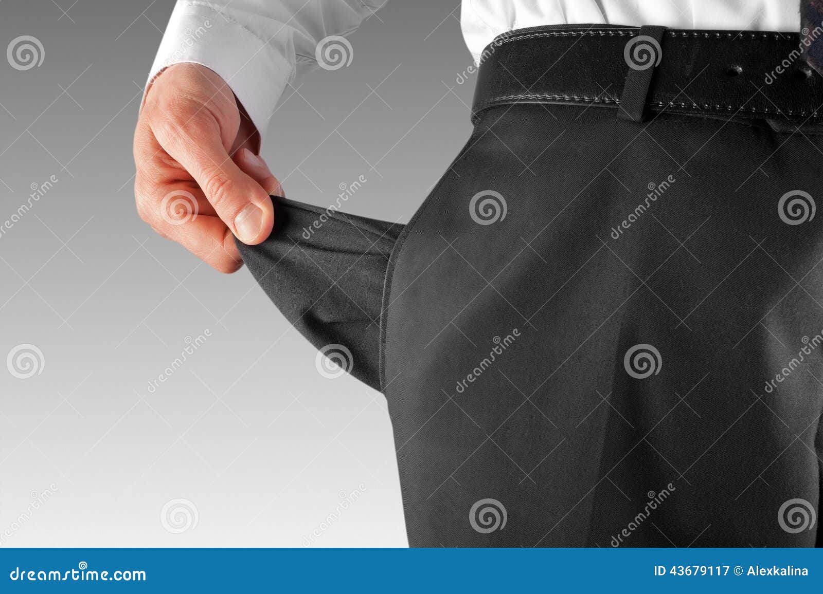 bankrupt man showing empty pocket